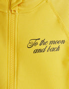 fabric & text detail of To the Moon UV Swimsuit Yellow by Mini Rodini