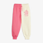 Travel agency split color sweatpants by Mini Rodini