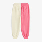 Travel agency split color sp sweatpants by Mini Rodini with pink and cream colour block design