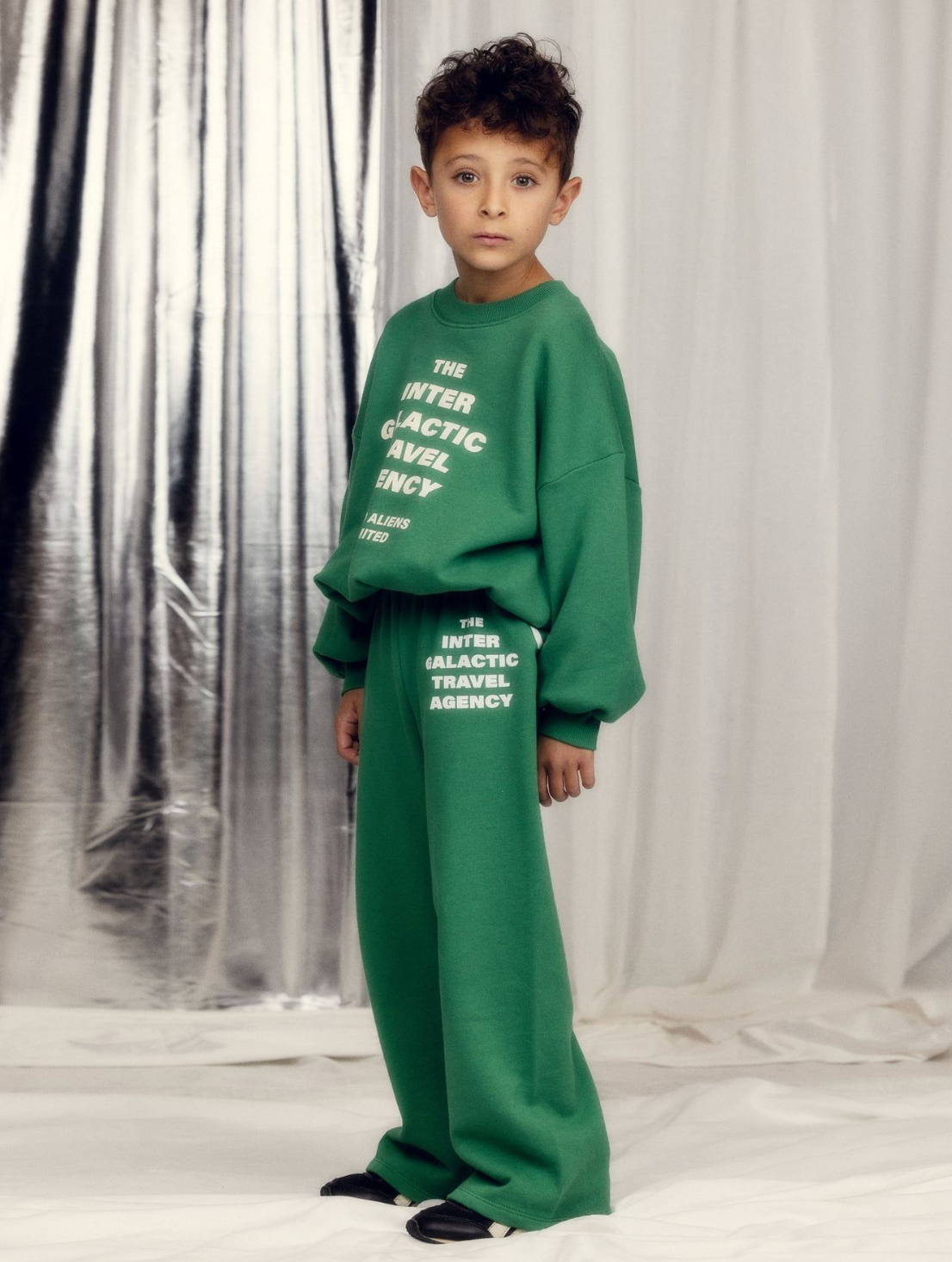Boy wearing Travel agency sp sweatpants - Green | Mini Rodini