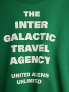 Close up of text on the Travel agency sp sweatshirt - Green | Mini Rodini