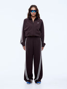 model wearing Ena Pelly Valentina Stripe Pant cocoa