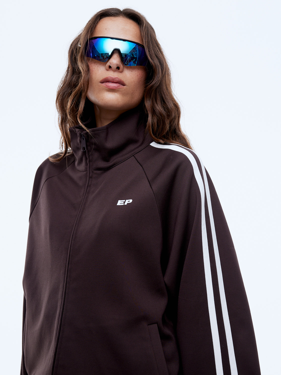 Cocoa brown zip through jacket with raglan sleeves and contrast stripe detailing lifestyle shot