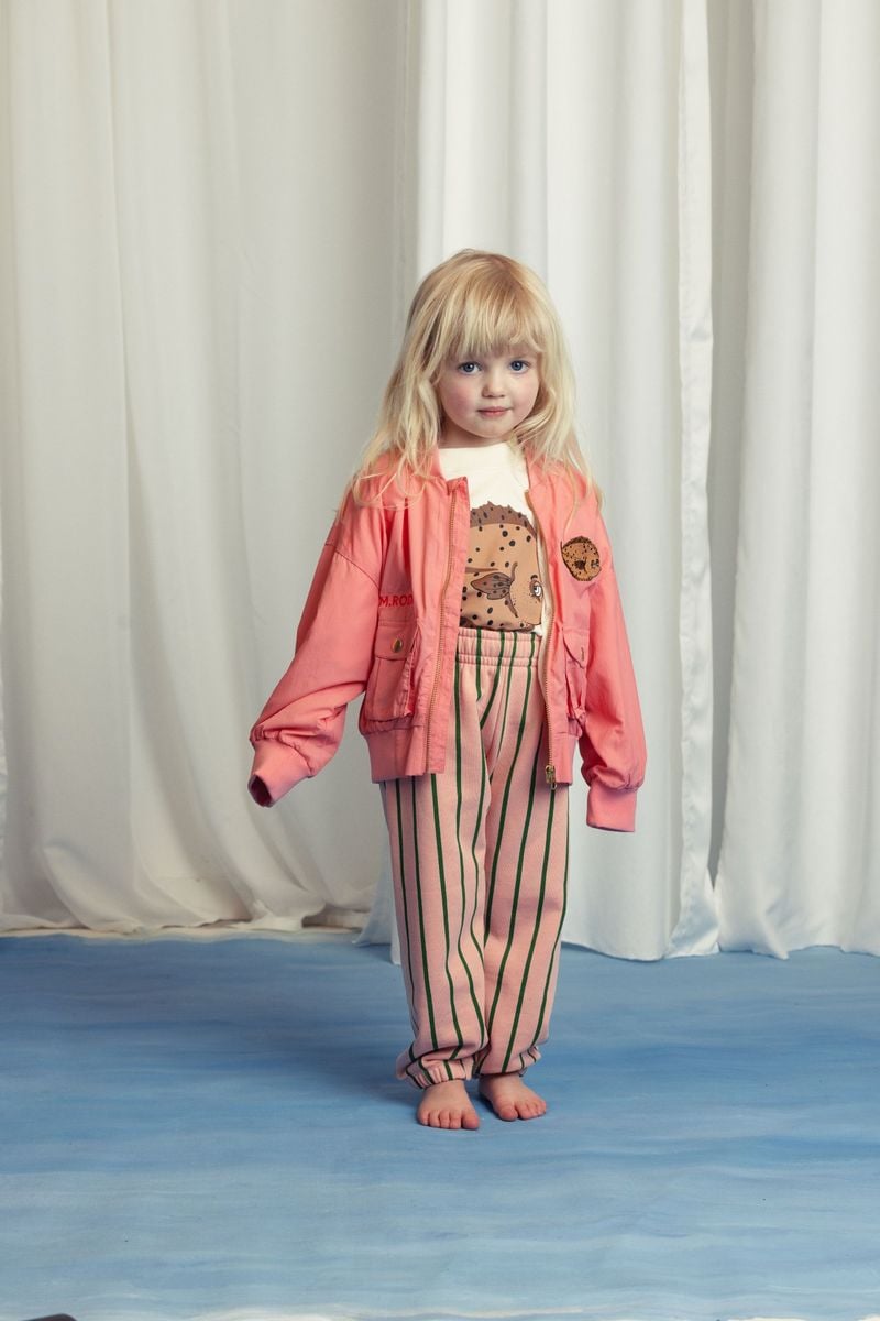 Girl wearing Vertical stripe sweatpants pink & green by Mini Rodini