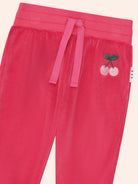 Close up of details on the Very Cherry Velour Trackpant | Huxbaby