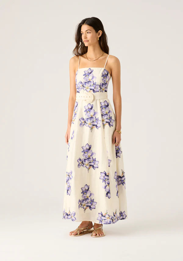 long spaghetti strap dress in white with purple flowers - Violetta Maxi Dress by MOS The Label worn by model with brown hair
