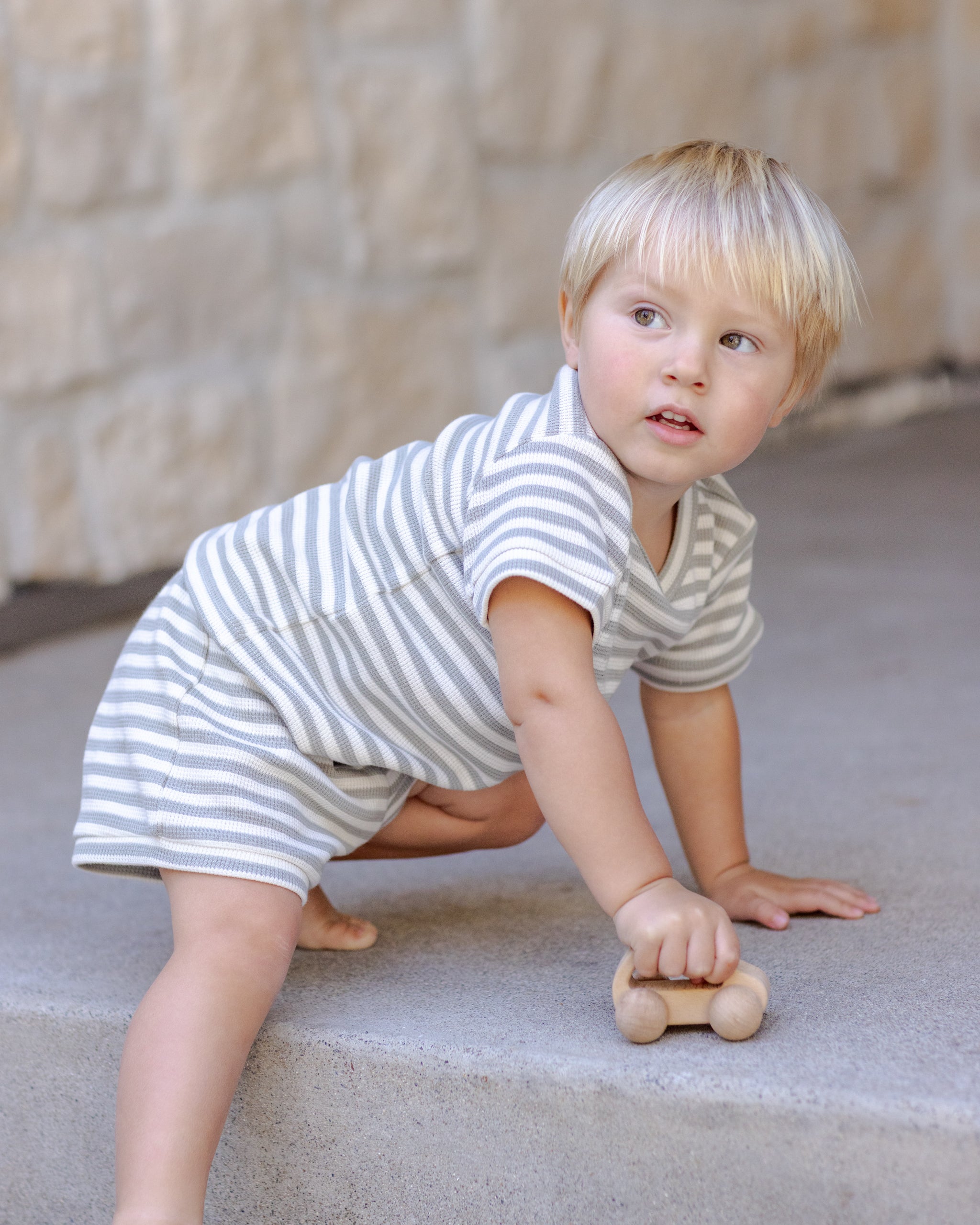 Side view of young boy wearing the Waffle sweater set sky stripe | Quincy Mae