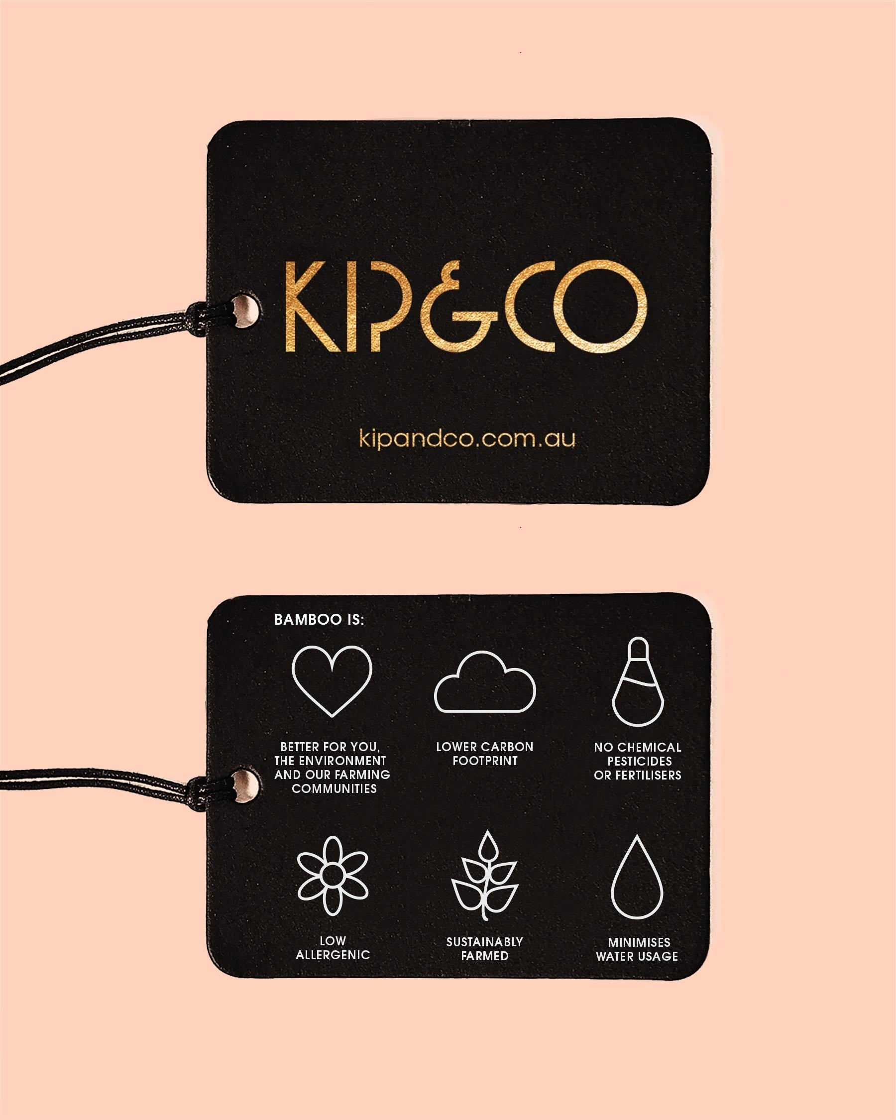 Black product tags showing bamboo fabric benefits and sustainability features