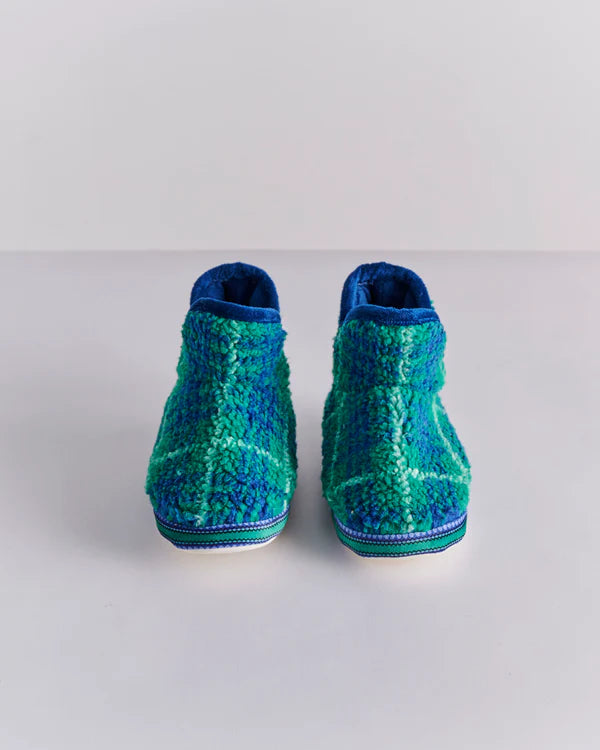 Back view of Kids winter slippers in blue and green tartan sherpa
