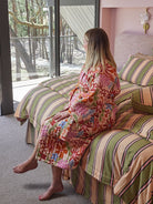 Lade wearing Mosey Me Winter Garden Robe garden print cotton percale loungewear lifestyle shot