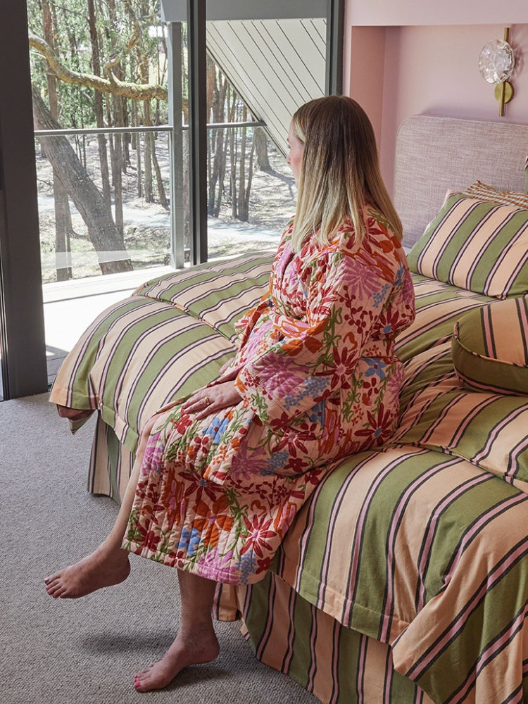 Lade wearing Mosey Me Winter Garden Robe garden print cotton percale loungewear lifestyle shot
