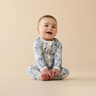 Baby wearing the Woodland Adventures Organic Zipsuit With Feet | Wilson + Frenchy