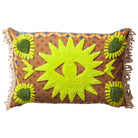 Brown printed lumbar cushion with lime green tufted star design, dark green corner accents, and cream rope fringe