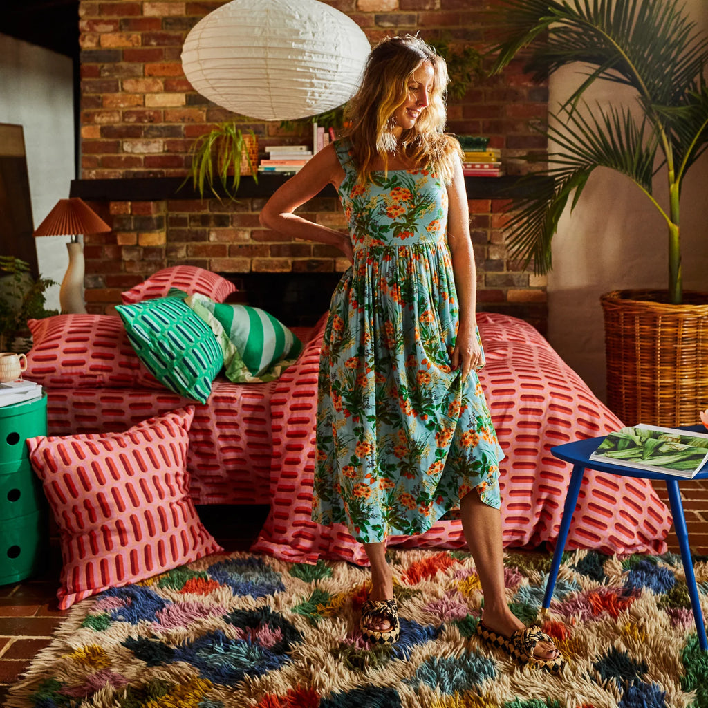 Sage & Clare Yarrow Strappy Maxi Dress worn by model in lounge room