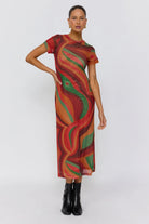 Three quarter view of Yoko Midi Dress featuring flowing swirl pattern and relaxed fit