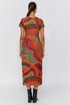 Back view of Yoko Midi Dress revealing continuous swirl pattern and short sleeve construction