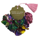 Zoi silk scrunchie set with brand tag showing two scrunchies in purple green multicolor prints