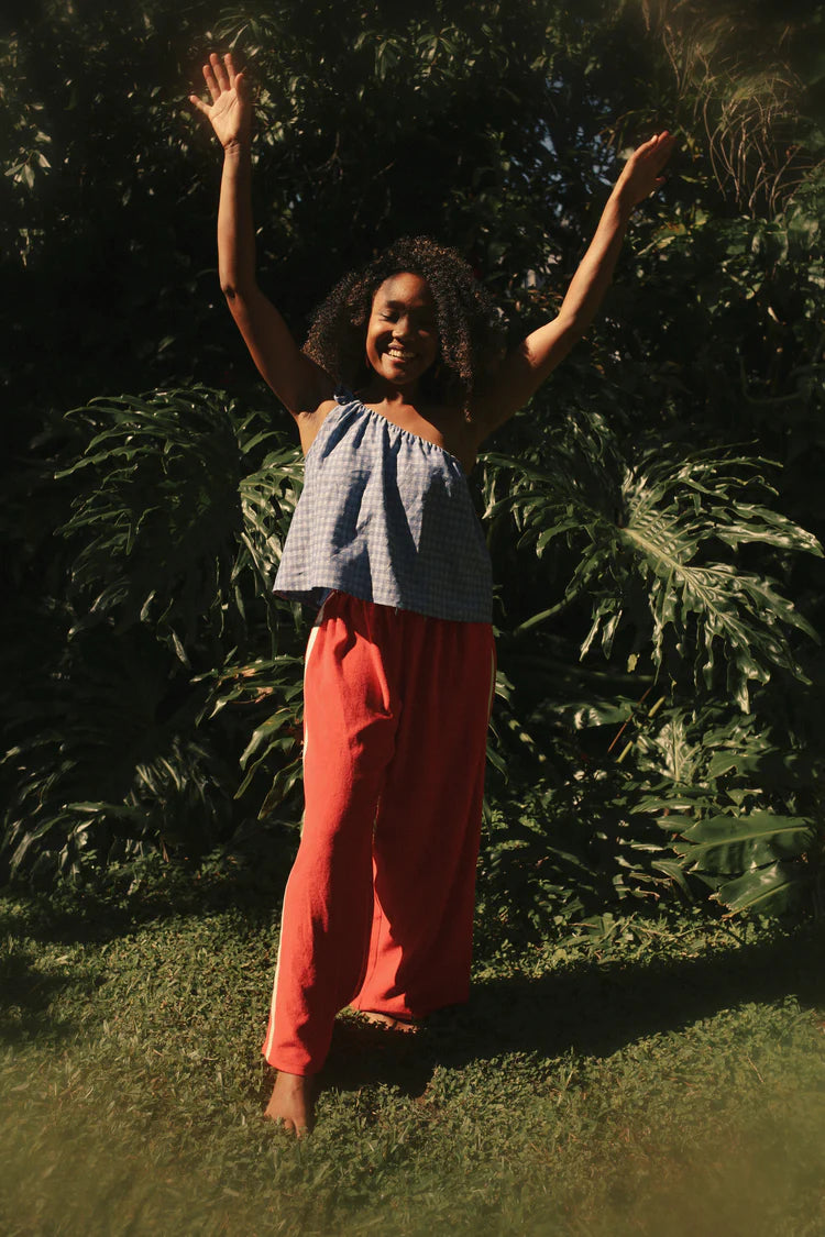 model wearing Apres Surf Pant by Atmosea – Chilli