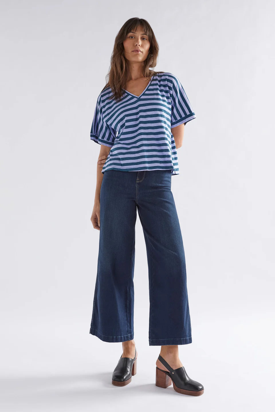 Model wearing blue stripped organic cotton tshirt by ELK