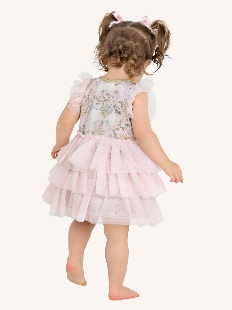back of girl wearing field of dreams signature tutu dress for baby by Fleur Harris 