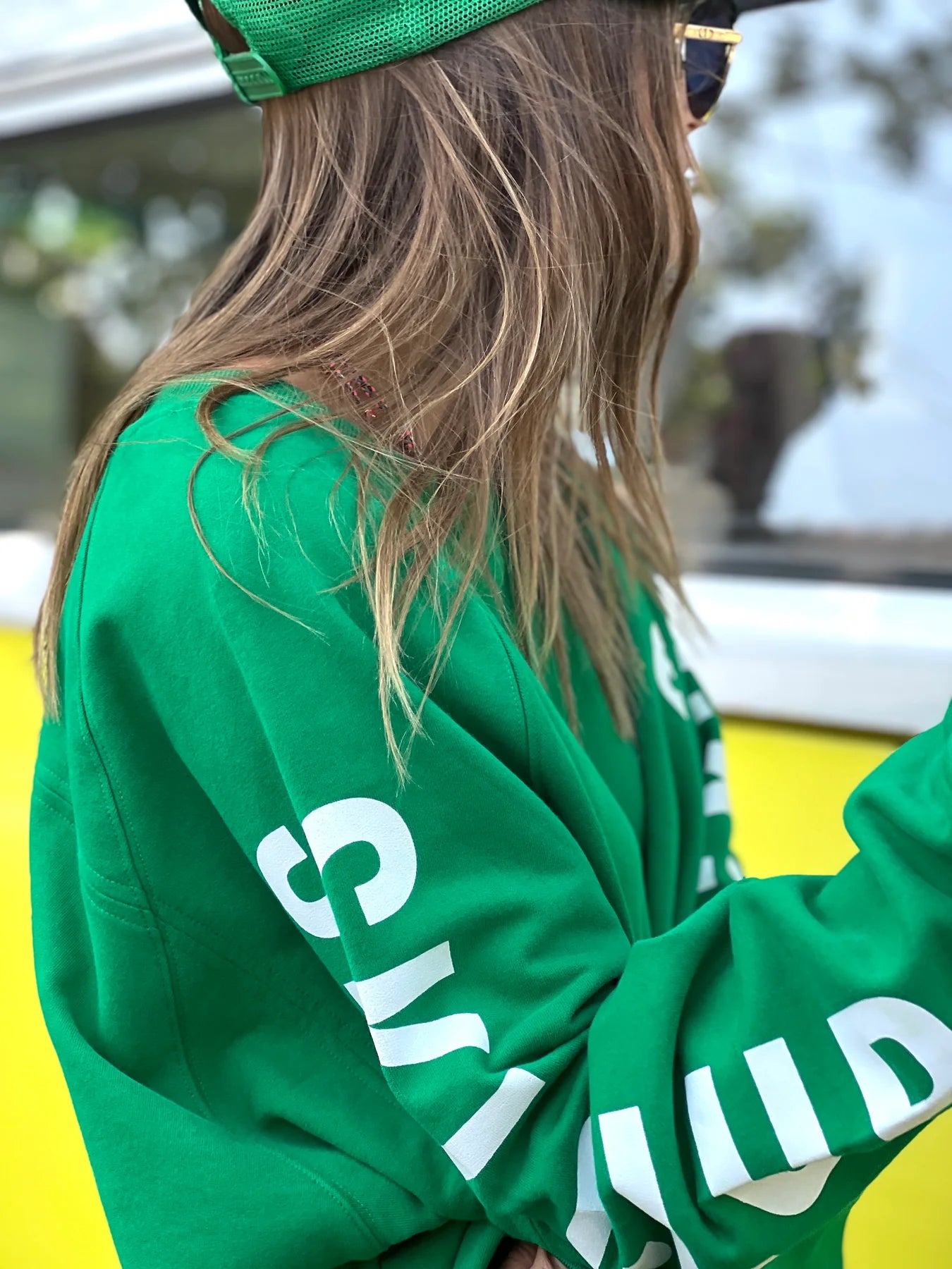 sleeve detail of green oversized ski jumper by Hammill & Co