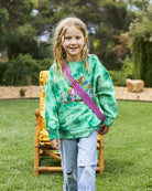 May Gibbs Collaboration with Kip&Co featuring a beautiful green jumper with May Gibbs characters on the front