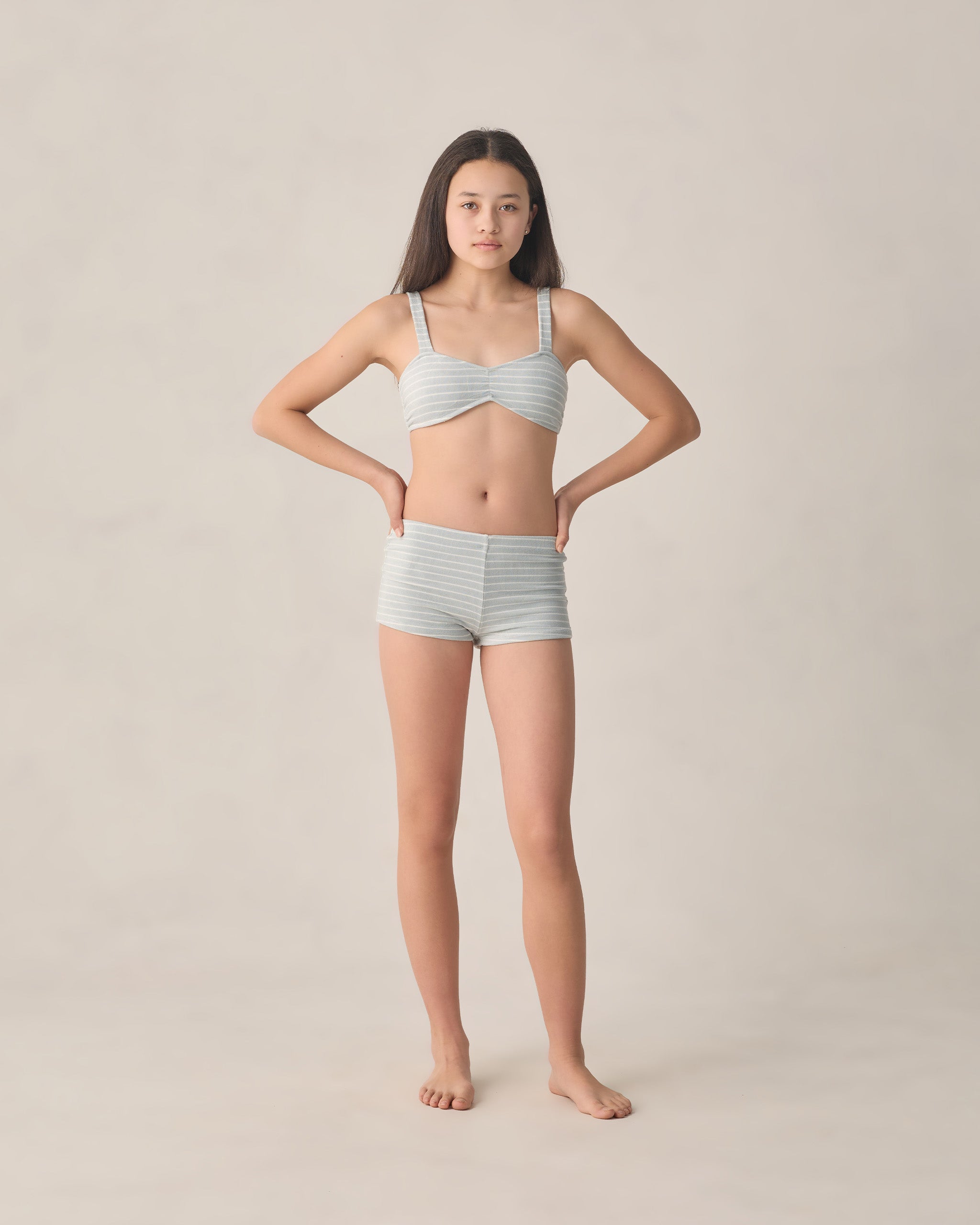 girl wearing Teen Alaya Bikini Set Seafoam Stripe by Rylee + Cru