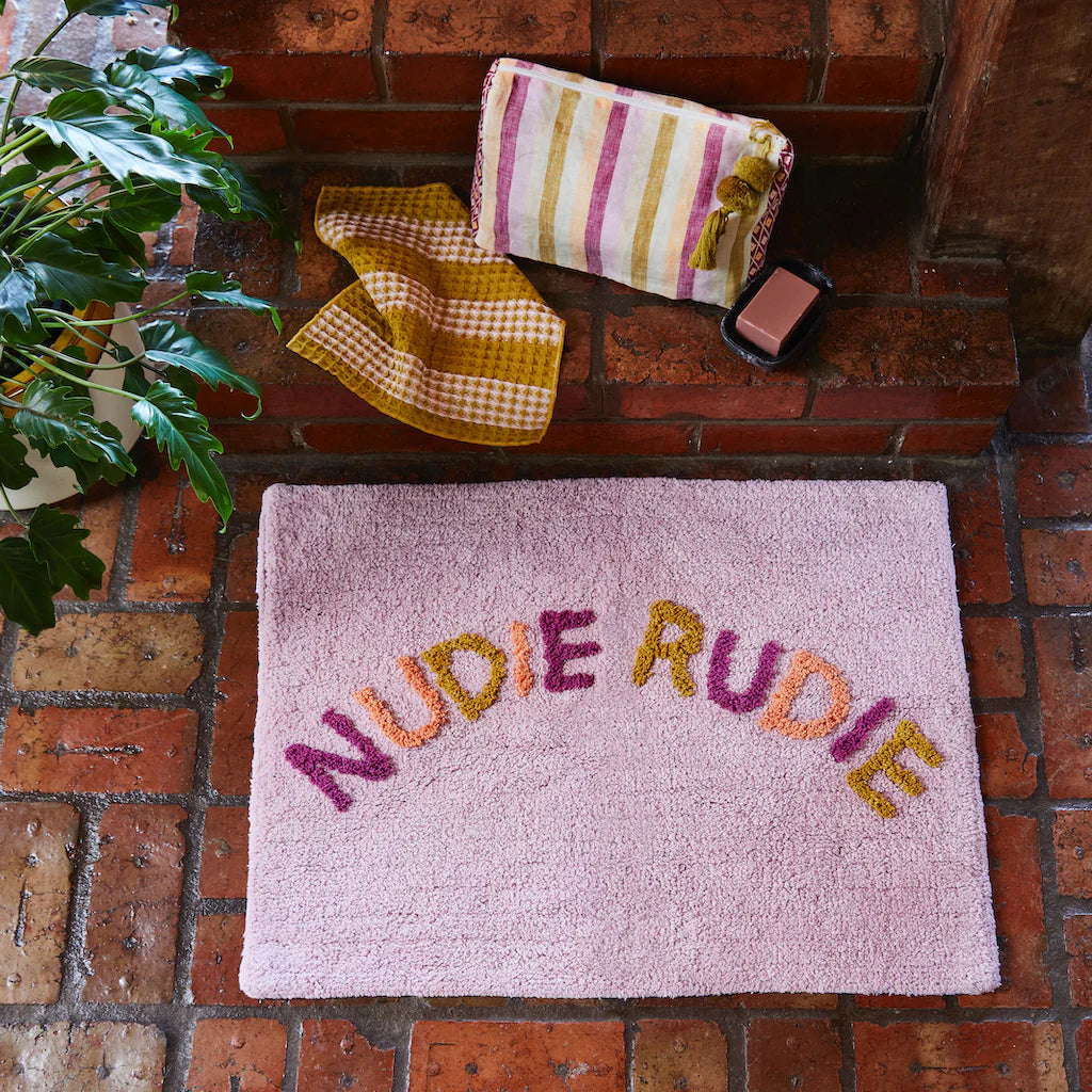 Tula Nudie Rudie Bath Mat Alegria by Sage & Clare in purple with multi colour writing
