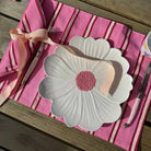 White and pink flower plate by noss as a table setting