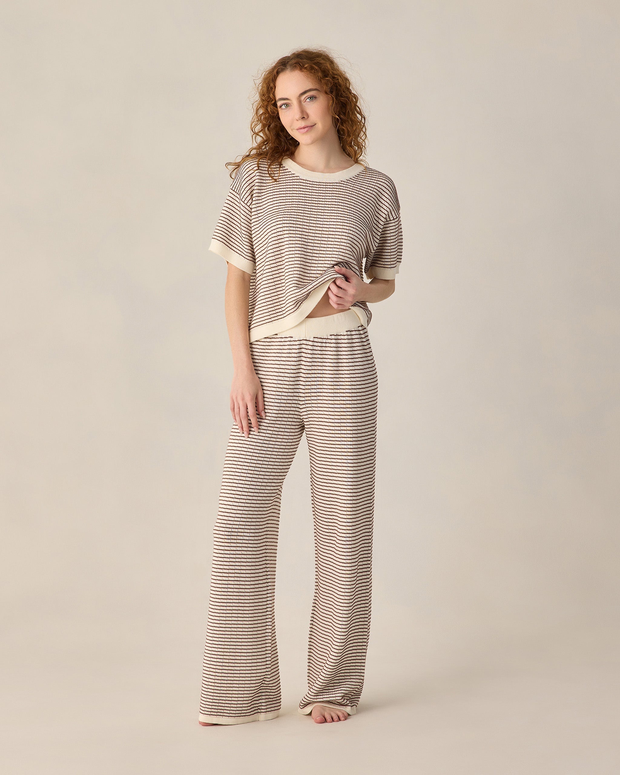 lady wearing Women's Knit Wide Leg Pant Chocolate Stripe by Rylee & Cru