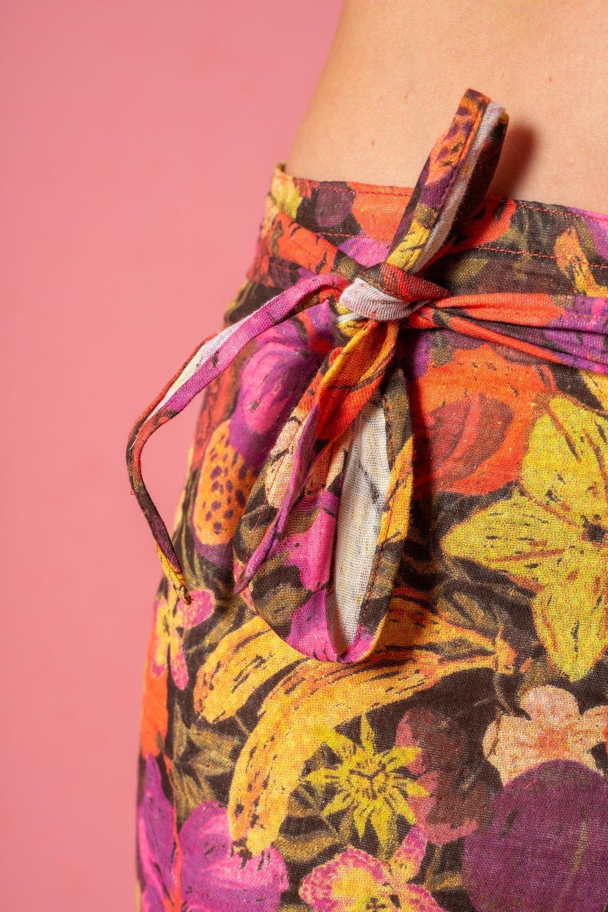 Wrap skirt in fruity by Atmosea side tie detail