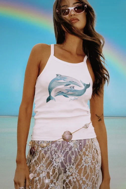 model wearing Yin Yang Dolphin Singlet by Sea Street - Graphic with two blue dolphins on white singlet top 