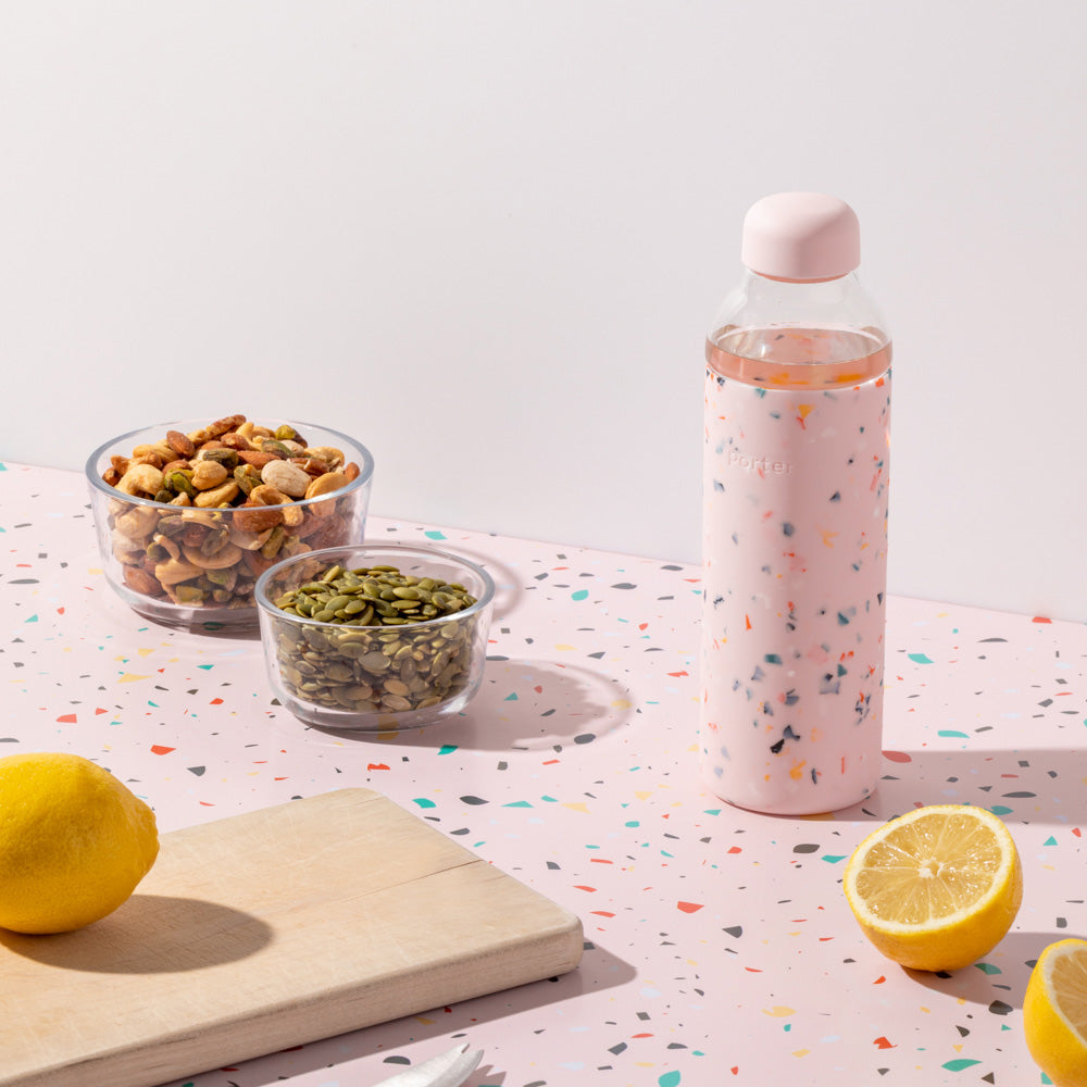 blush pink water bottle by porter. Lifestyle image. 