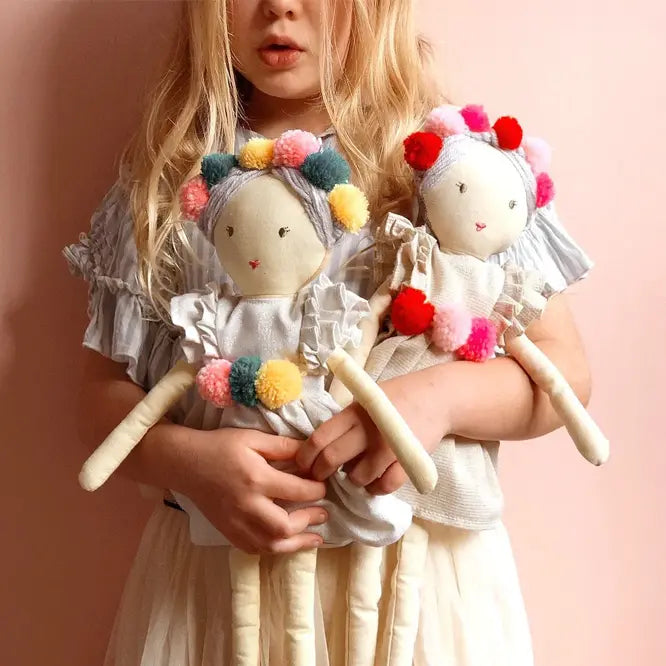 Nana Huchy Dolls, Miss Frida, in the arms of girl