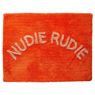 Tula Nudie Rudie bath mat by sage and clare, in bright orange colour