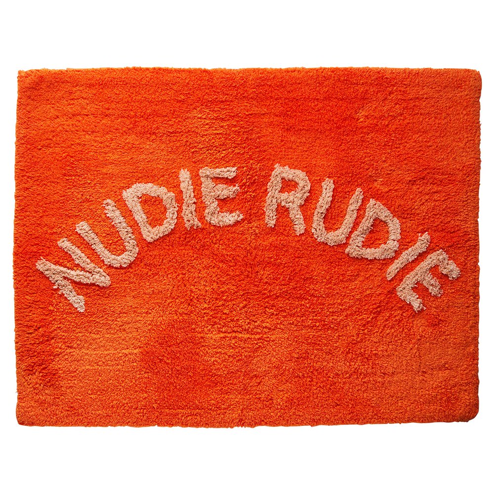 Tula Nudie Rudie bath mat by sage and clare, in bright orange colour